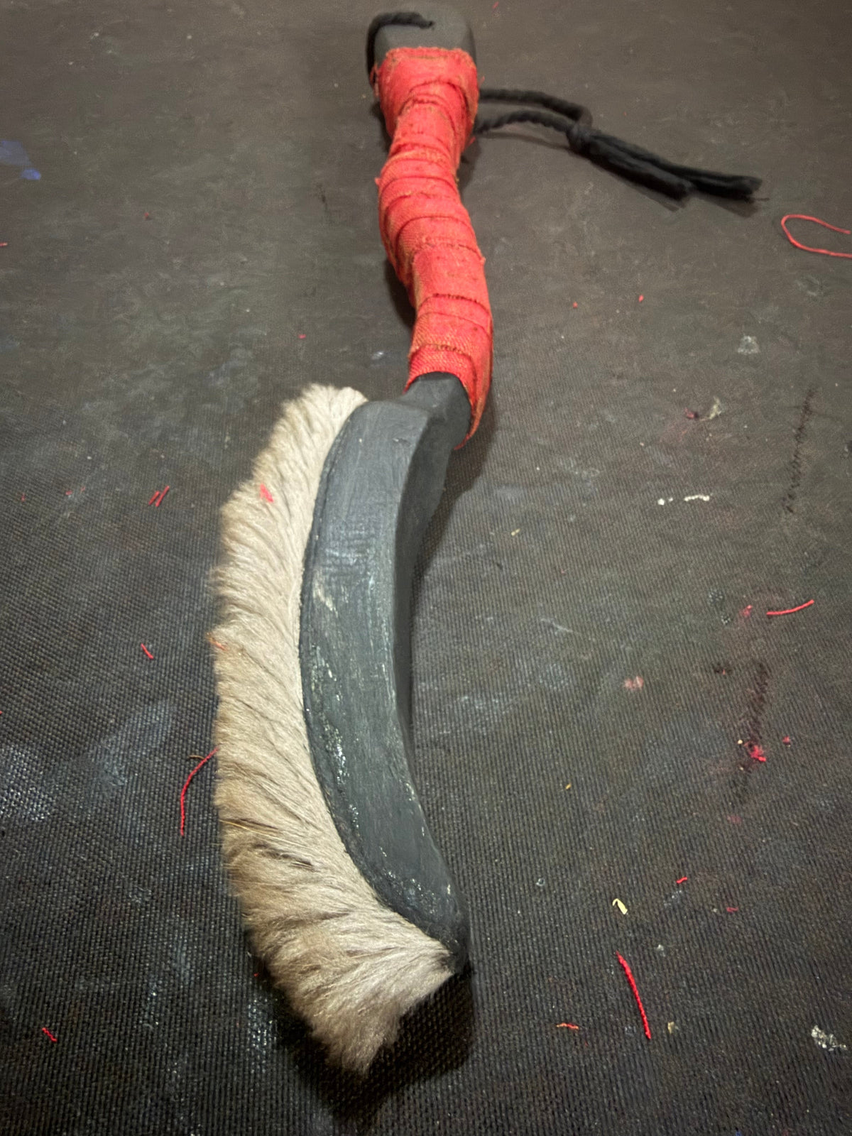 Beaver fur striking face of the hand-carved pine beater