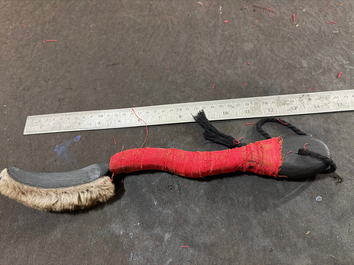 Hand-carved beater, curve and grip detail