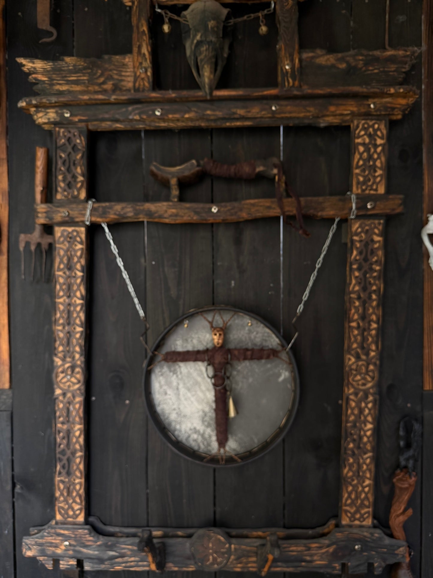 Keeper of the Way Siberian drum on a ritual wall