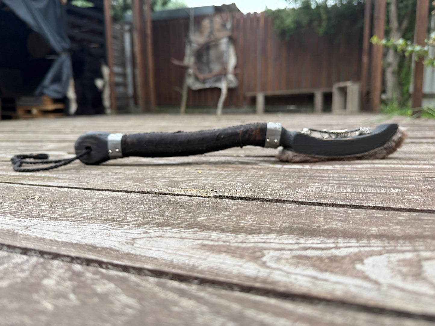 Ritual ring beater — handle wrap and metal collars